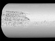 The Center for Quantitative Imaging created an X-ray computed tomography image from a 1.5 mm-long steel cylinder after it was exposed to a high-temperature, high-pressure aqueous solution. Credit: Derek Hall et al. All Rights Reserved.