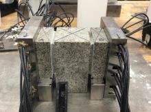 Double-direct shear configuration consisting of three granite blocks