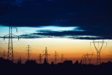 Photo of power lines along the skyline.