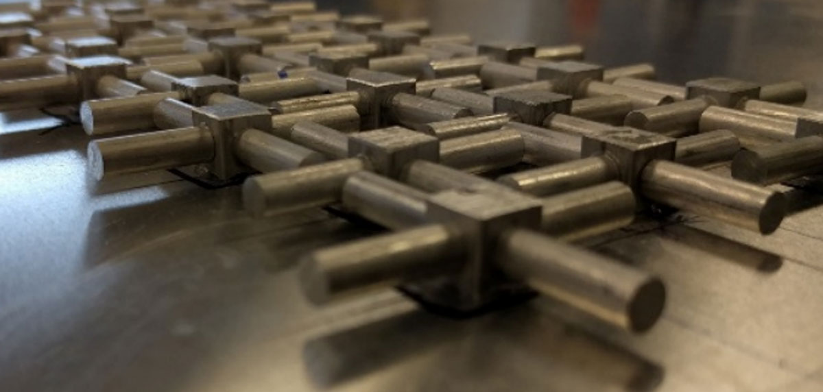 An array of resonators glued on an aluminum plate. IMAGE- Chris Hakoda