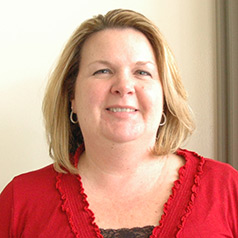 Kelly Rhoades,  administrative assistant